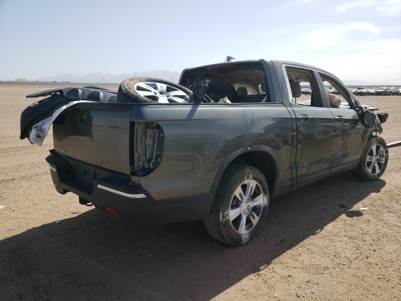 Photo 4 from auction – 2017 HONDA RIDGELINE with VIN 5FPYK2F50HB006543