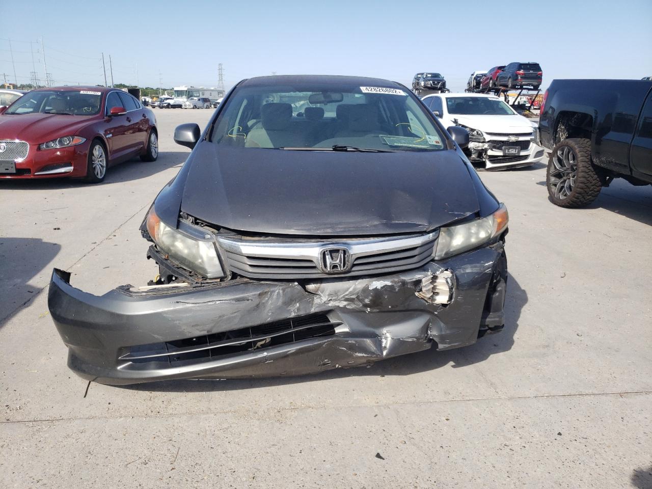 Photo 9 from auction – 2012 HONDA CIVIC LX with VIN 2HGFB2F59CH558174