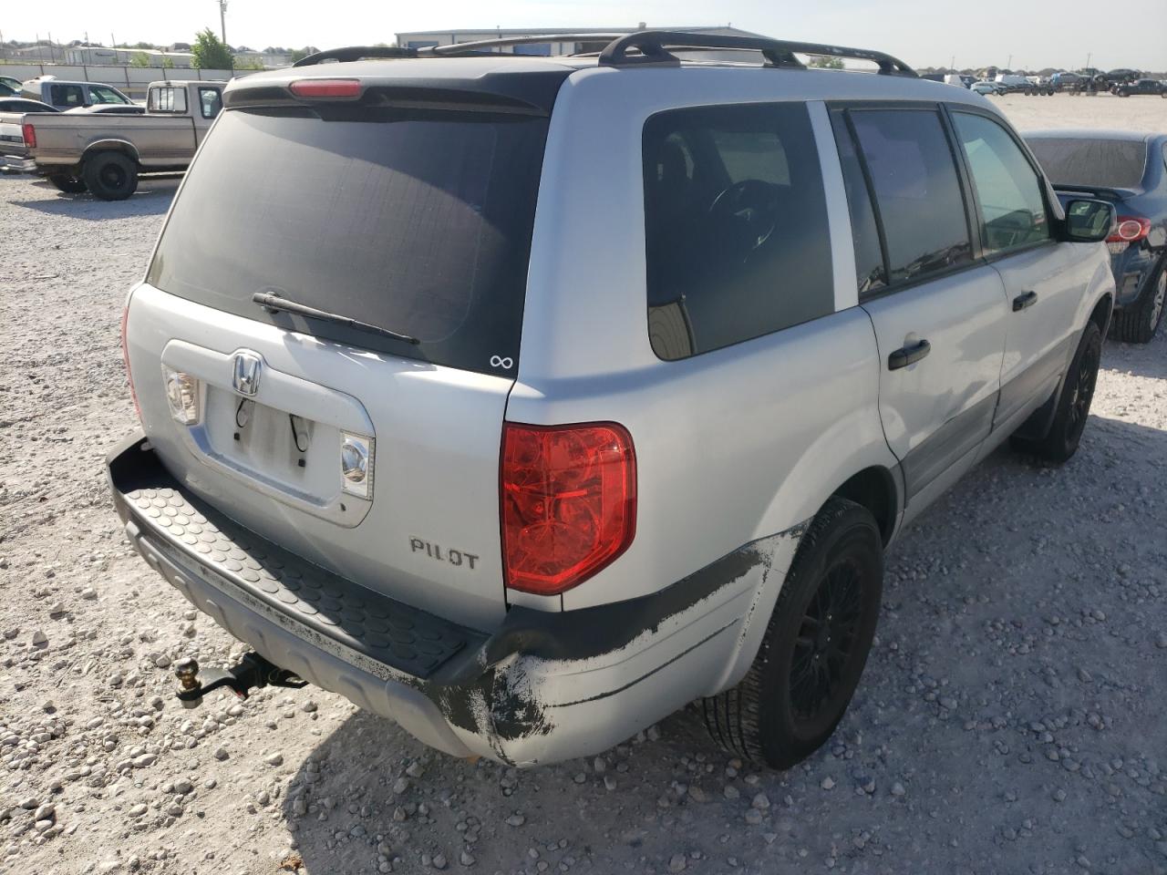 Photo 4 from auction – 2004 HONDA PILOT LX with VIN 2HKYF181X4H509672