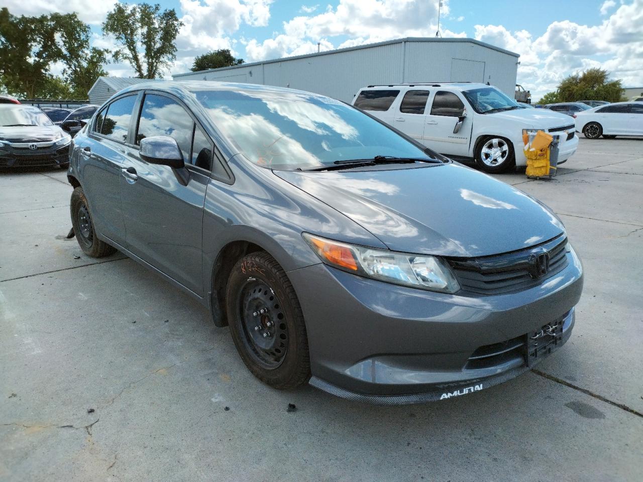 HONDA CIVIC LX 2012 with VIN 19XFB2F5XCE388112 - Photo from auction