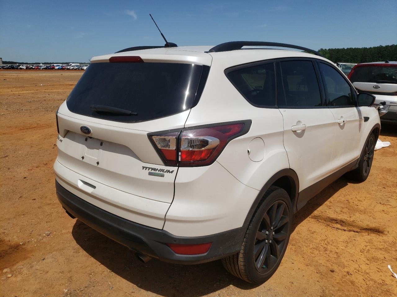 Photo 4 from auction – 2017 FORD ESCAPE TIT with VIN 1FMCU0JD1HUB42859