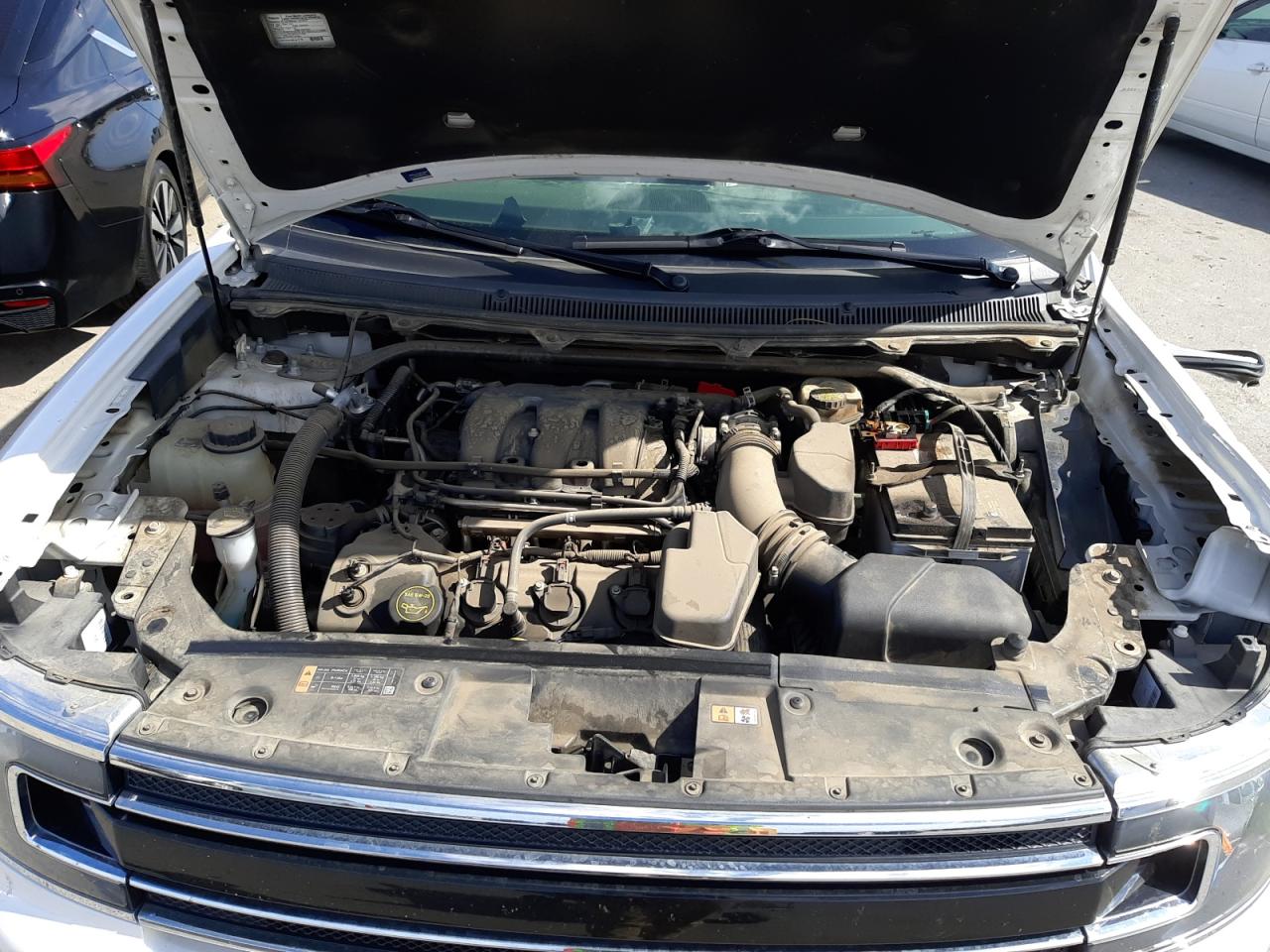 Photo 7 from auction – 2016 FORD FLEX SEL with VIN 2FMGK5C84GBA07982