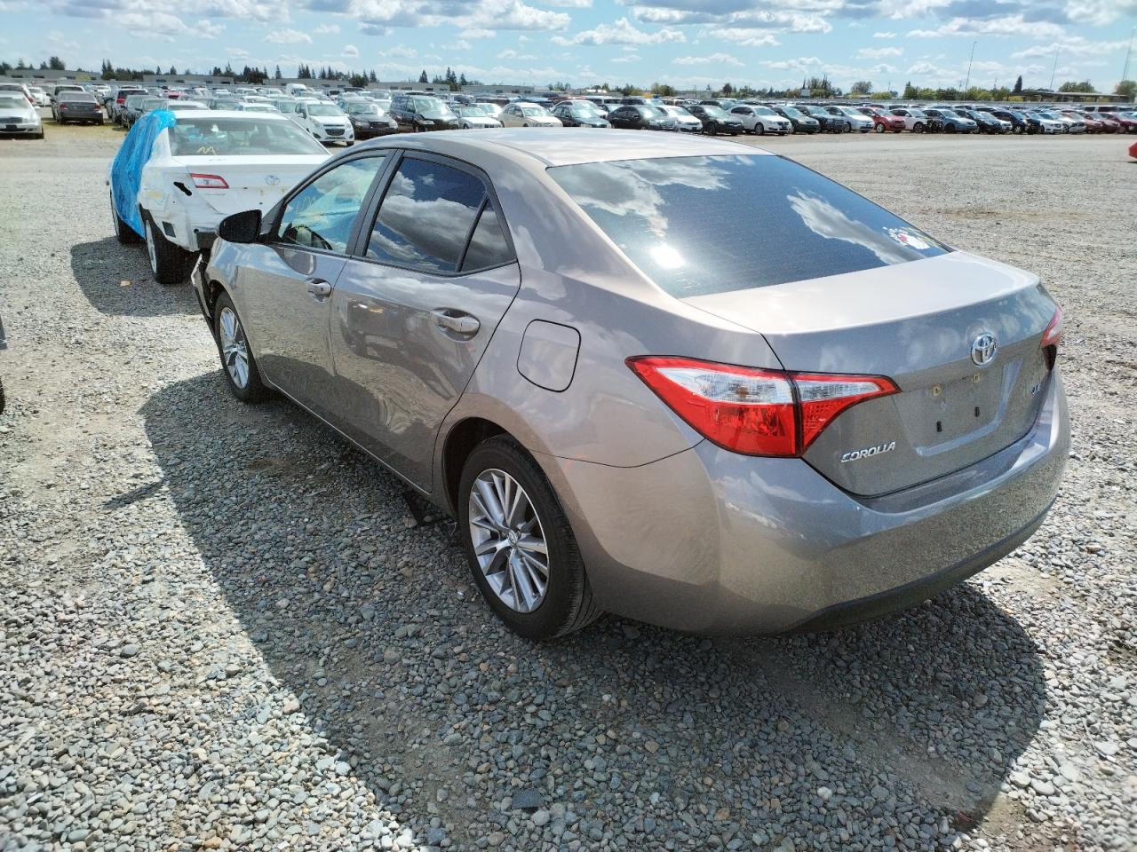 Photo 3 from auction – 2014 TOYOTA COROLLA L with VIN 5YFBURHEXEP085749