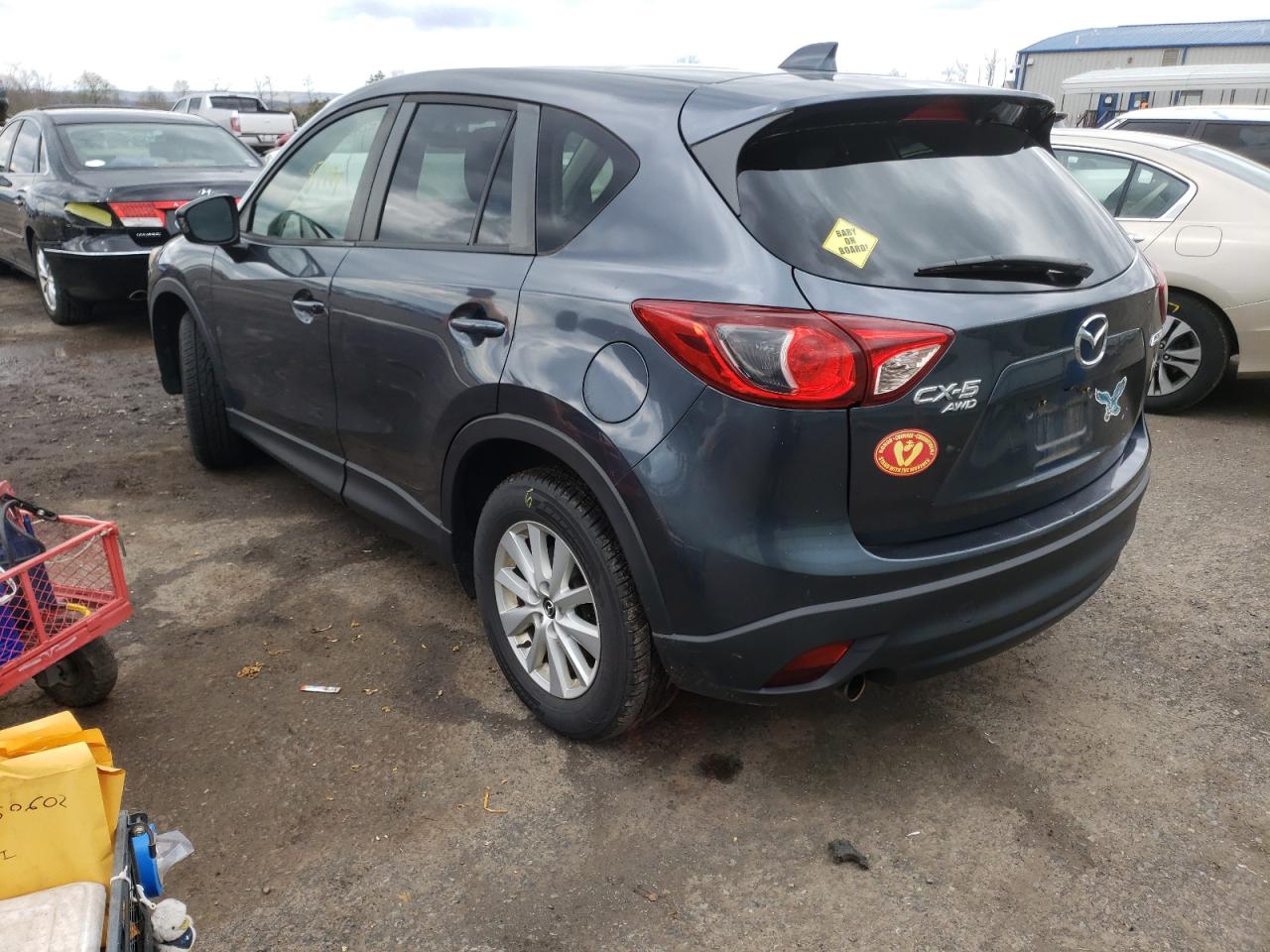 Photo 3 from auction – 2013 MAZDA CX-5 TOURI with VIN JM3KE4CE6D0132136