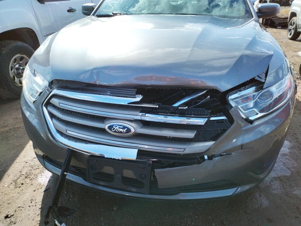Photo 9 from auction – 2014 FORD TAURUS SEL with VIN 1FAHP2E84EG133244