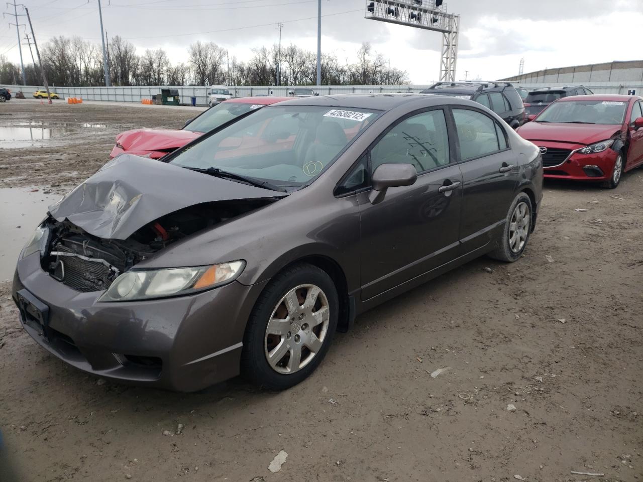 Photo 2 from auction – 2010 HONDA CIVIC LX with VIN 19XFA1F5XAE036660