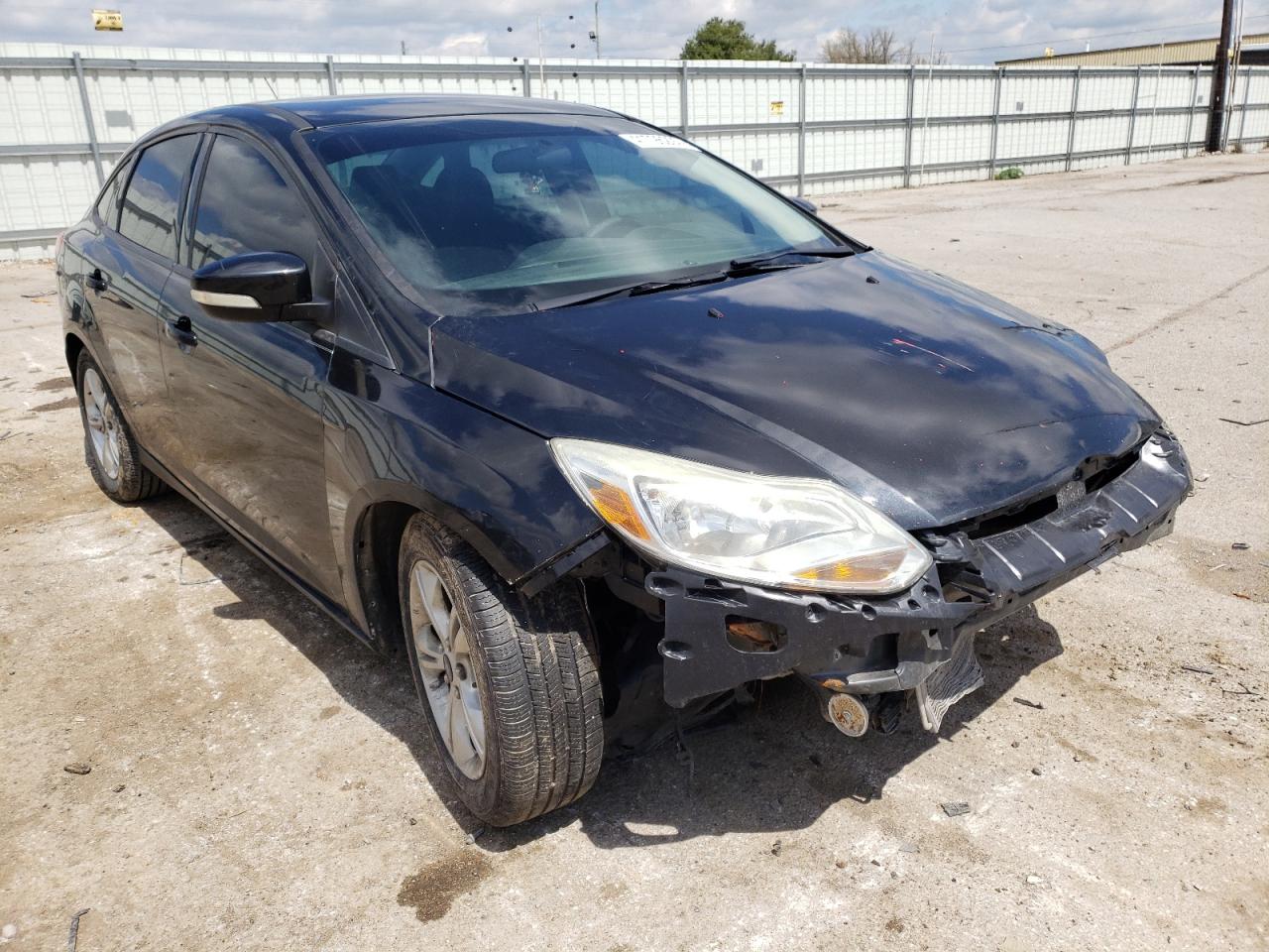 FORD FOCUS SE 2014 with VIN 1FADP3F24EL329514 - Photo from auction