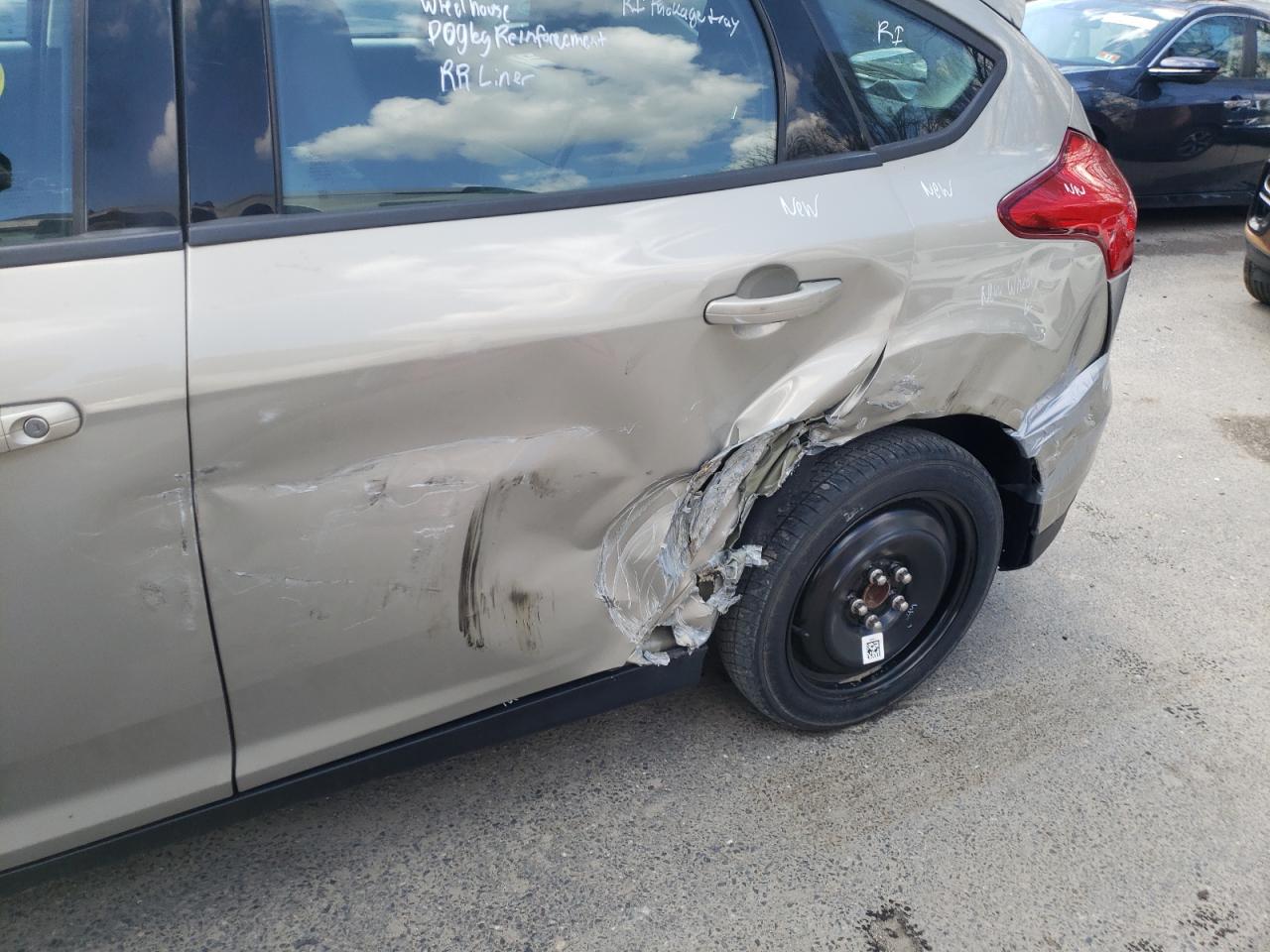 Photo 9 from auction – 2016 FORD FOCUS SE with VIN 1FADP3K29GL259744