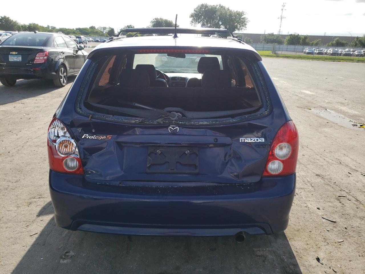 Photo 9 from auction – 2002 MAZDA PROTEGE PR with VIN JM1BJ245721455254