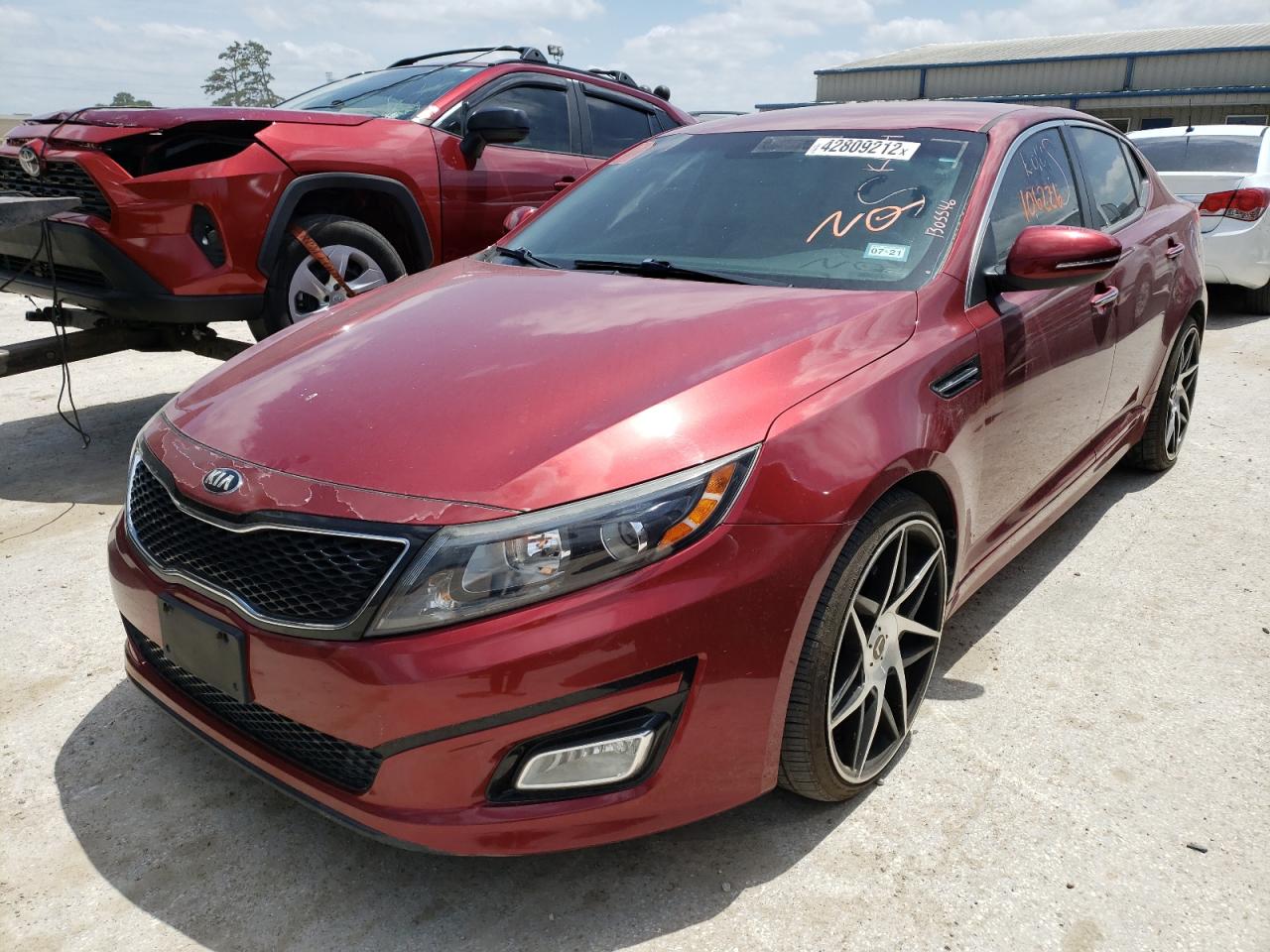 Photo 2 from auction – 2015 KIA OPTIMA LX with VIN 5XXGM4A70FG394659