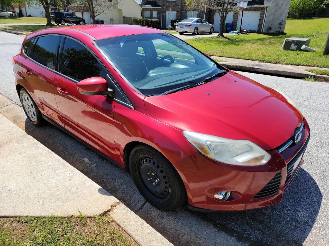 FORD FOCUS SE 2012 with VIN 1FAHP3K23CL382077 - Photo from auction
