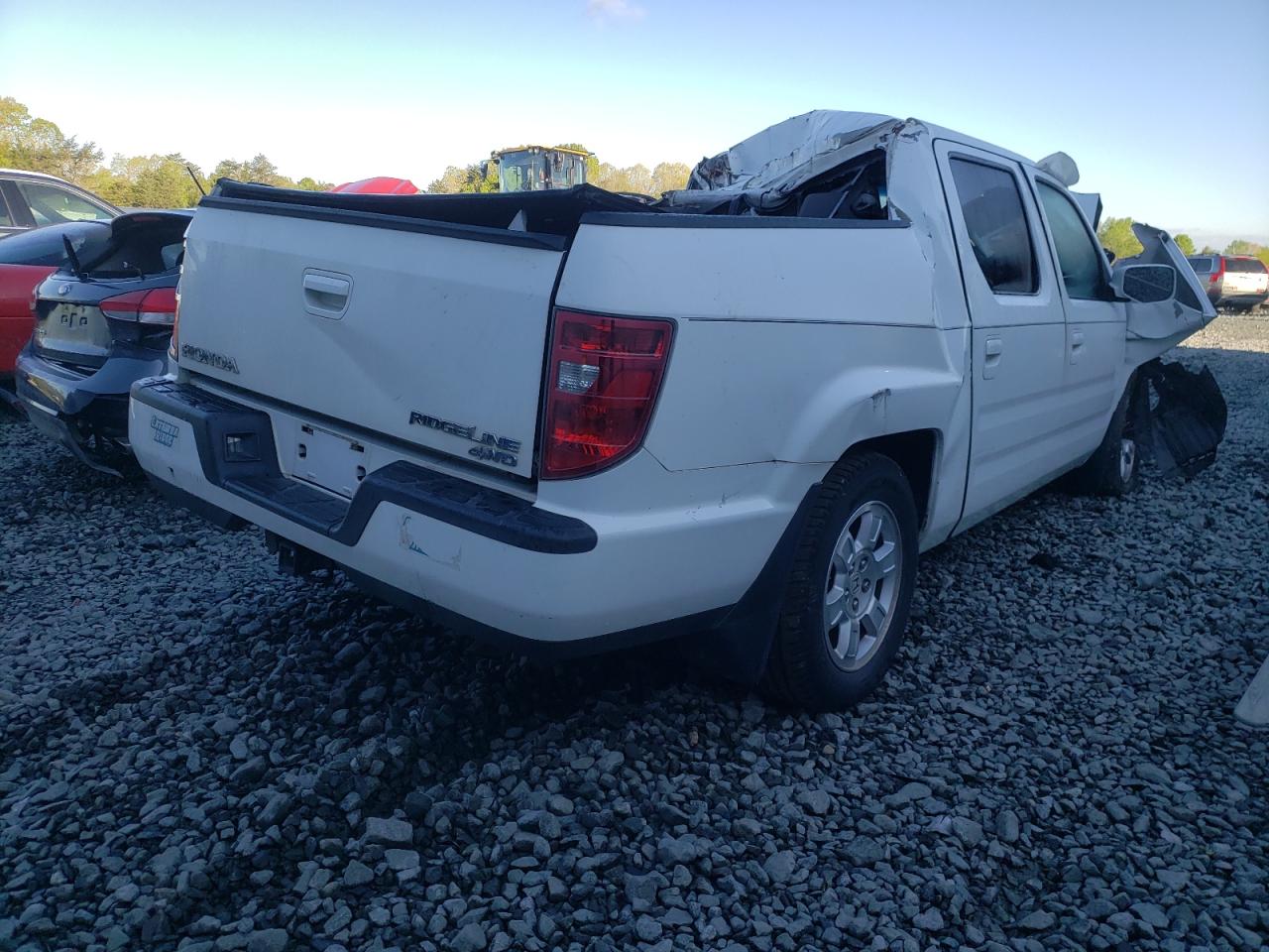Photo 4 from auction – 2010 HONDA RIDGELINE with VIN 5FPYK1F45AB002401
