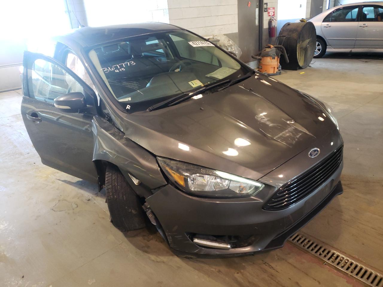 FORD FOCUS SE 2016 with VIN 1FADP3KE6GL211192 - Photo from auction