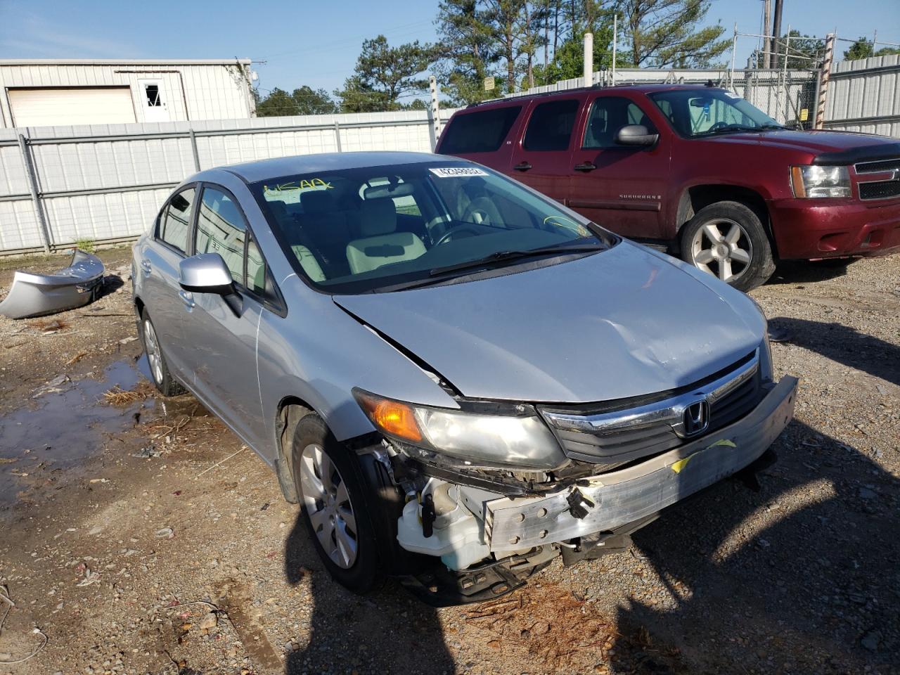 HONDA CIVIC LX 2012 with VIN 2HGFB2F53CH566514 - Photo from auction