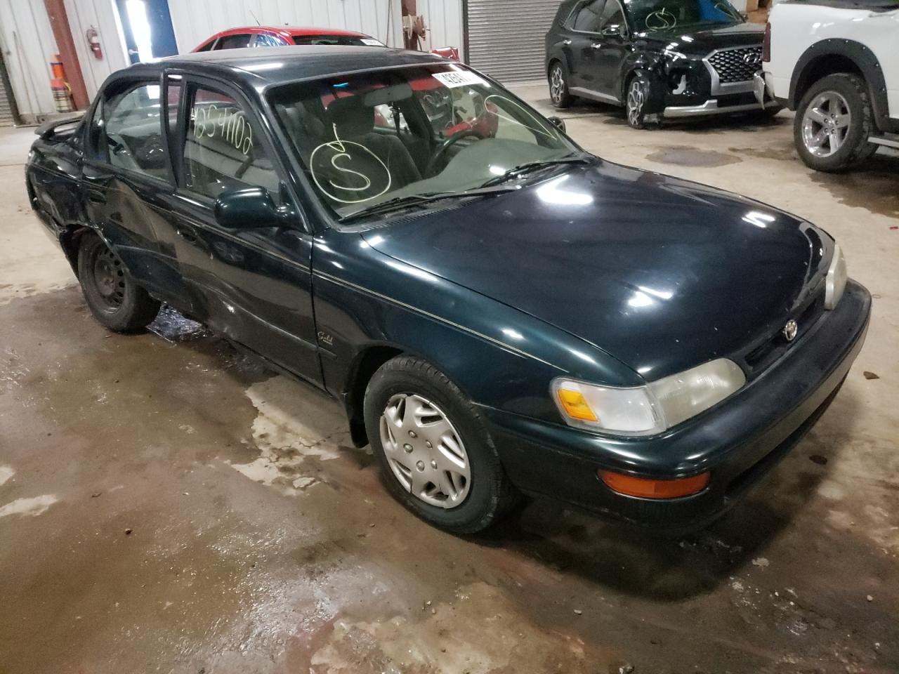 TOYOTA COROLLA 1997 with VIN 1NXBB02EXVZ651109 - Photo from auction