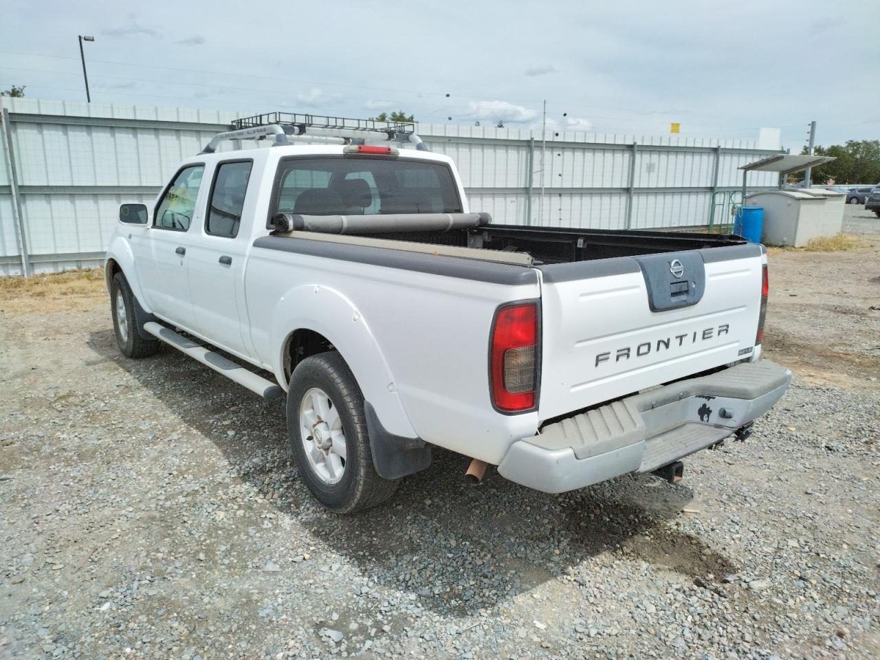 Photo 3 from auction – 2003 NISSAN FRONTIER C with VIN 1N6ED29X33C458735