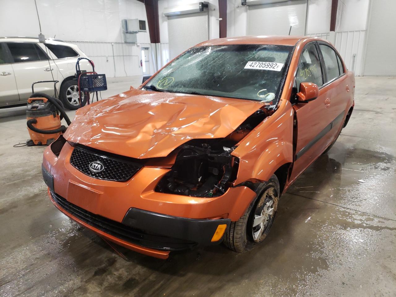 Photo 2 from auction – 2009 KIA RIO BASE with VIN KNADE223896543660