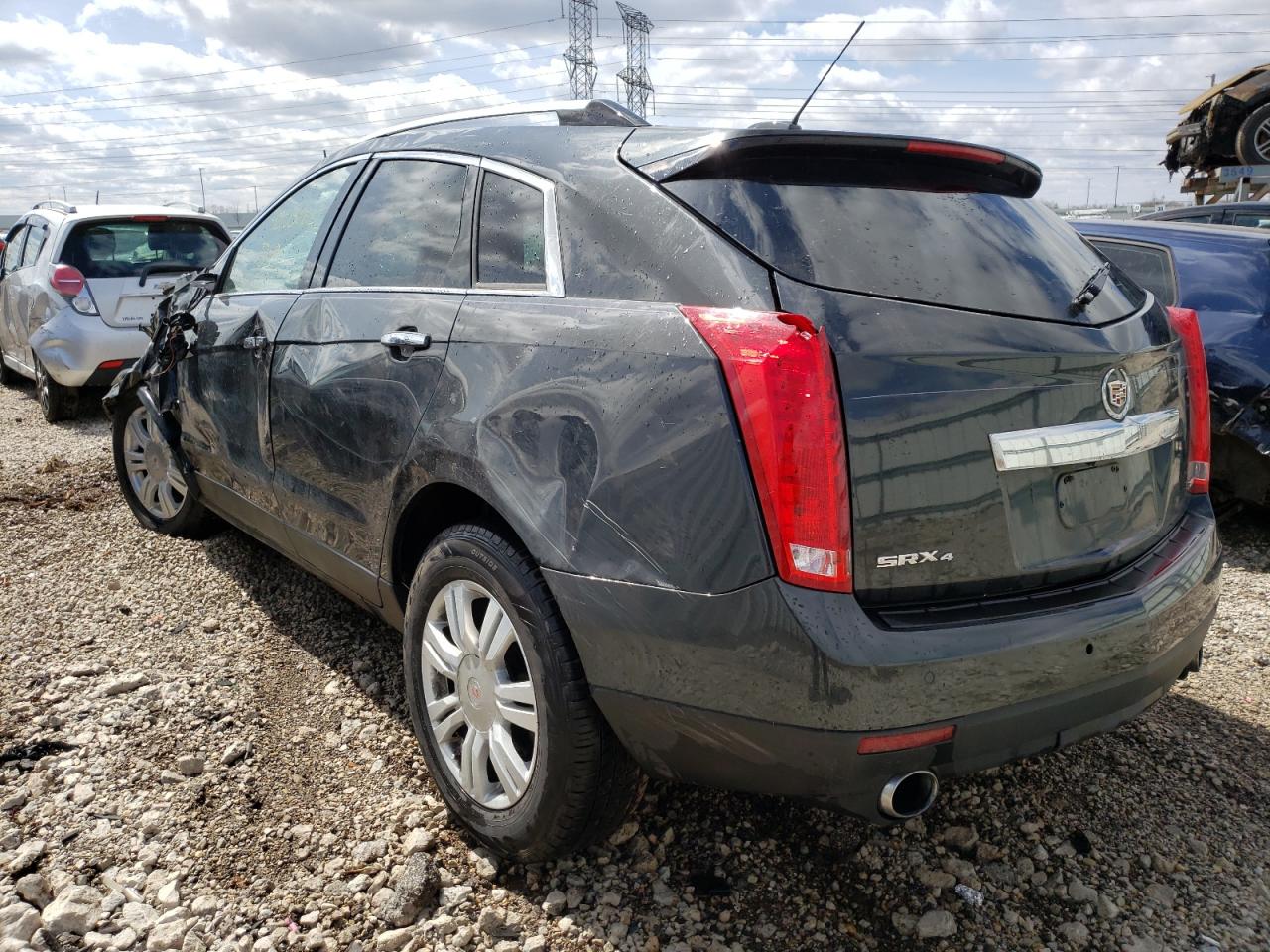 Photo 3 from auction – 2015 CADILLAC SRX LUXURY with VIN 3GYFNEE30FS620063