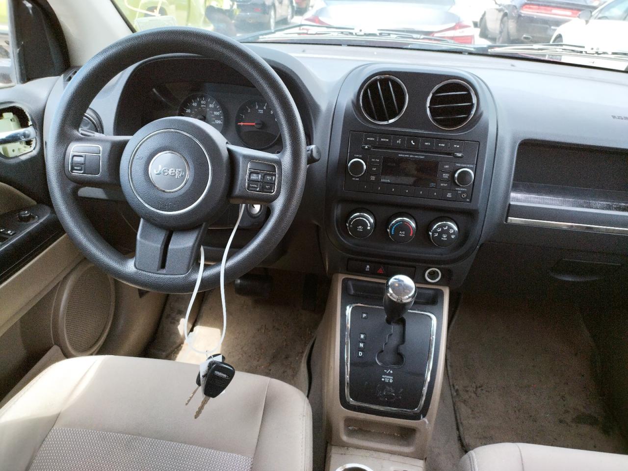 Photo 9 from auction – 2012 JEEP COMPASS SP with VIN 1C4NJCBA4CD526378
