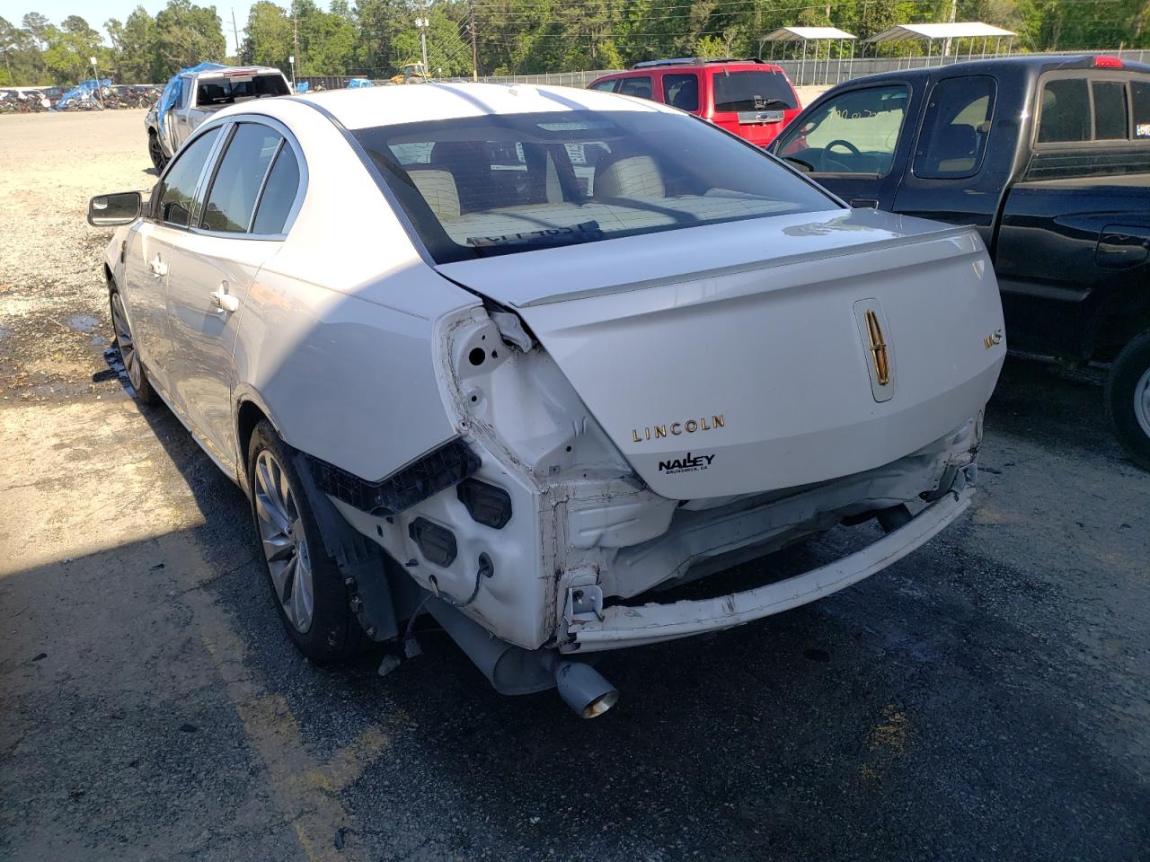 Photo 3 from auction – 2013 LINCOLN MKS with VIN 1LNHL9DK2DG603759