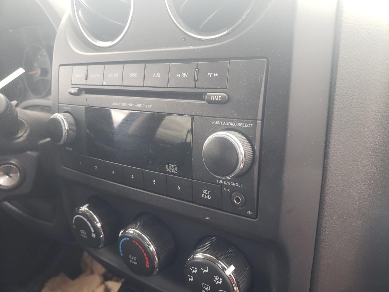 Photo 9 from auction – 2015 JEEP COMPASS SP with VIN 1C4NJCBA7FD185319