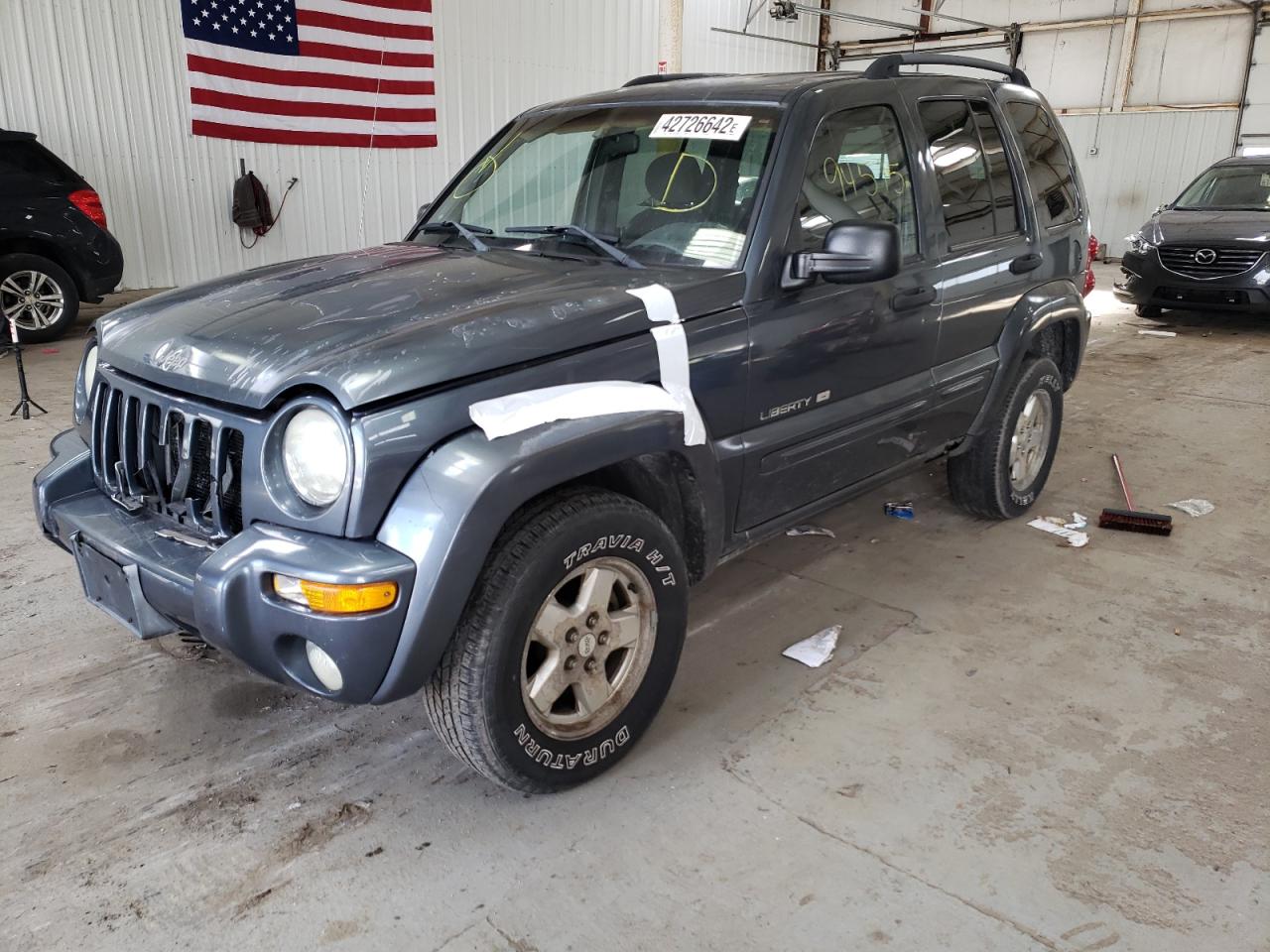 Photo 2 from auction – 2002 JEEP LIBERTY LI with VIN 1J4GL58K32W215679