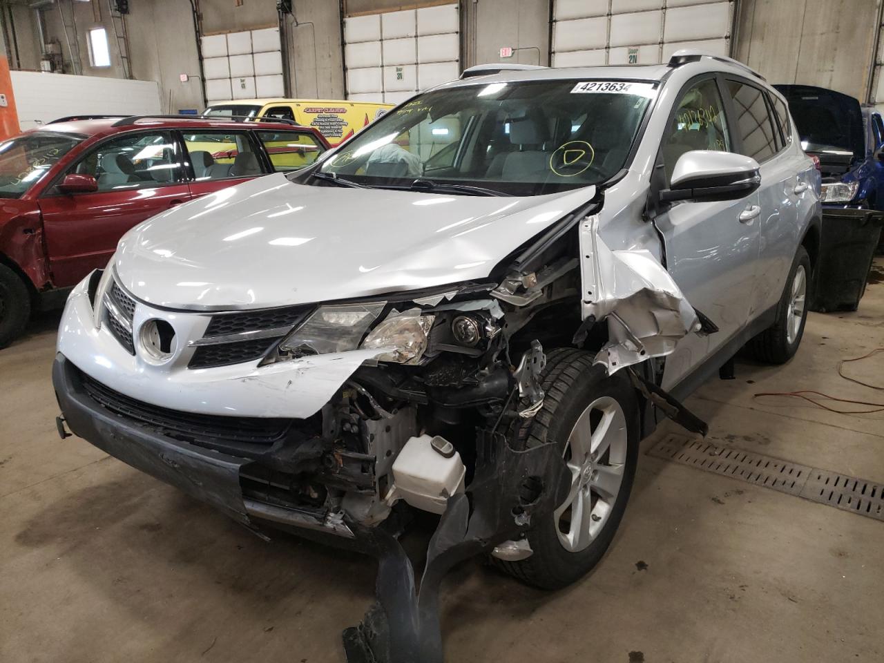 Photo 2 from auction – 2014 TOYOTA RAV4 XLE with VIN JTMRFREV8ED049557
