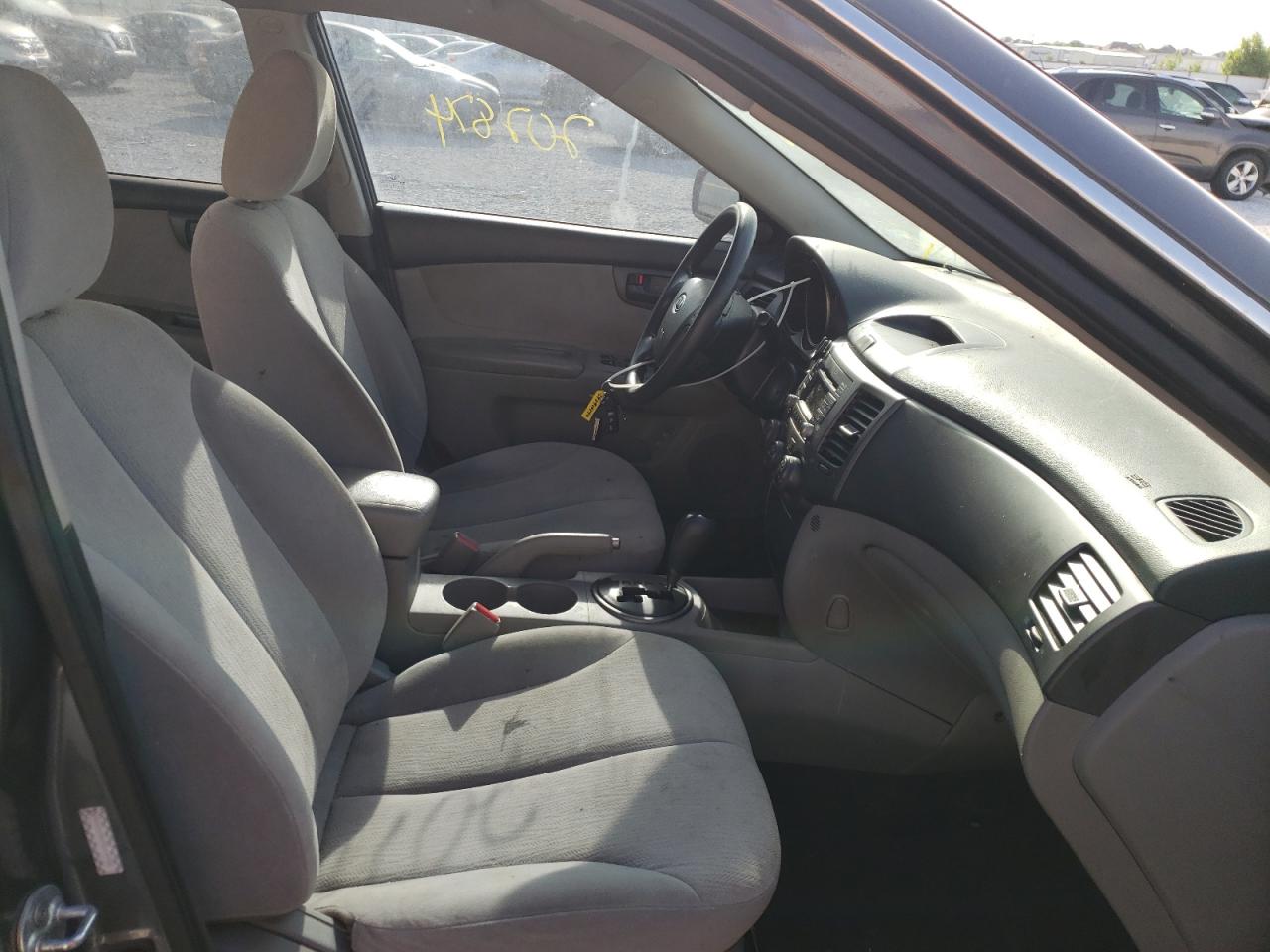 Photo 5 from auction – 2009 KIA OPTIMA LX with VIN KNAGE228395319758