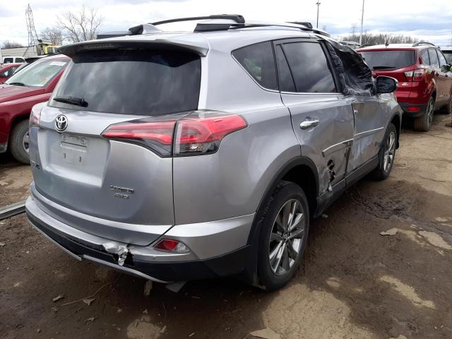 Photo 4 from auction – 2018 TOYOTA RAV4 LIMIT with VIN JTMDFREV1JD254724