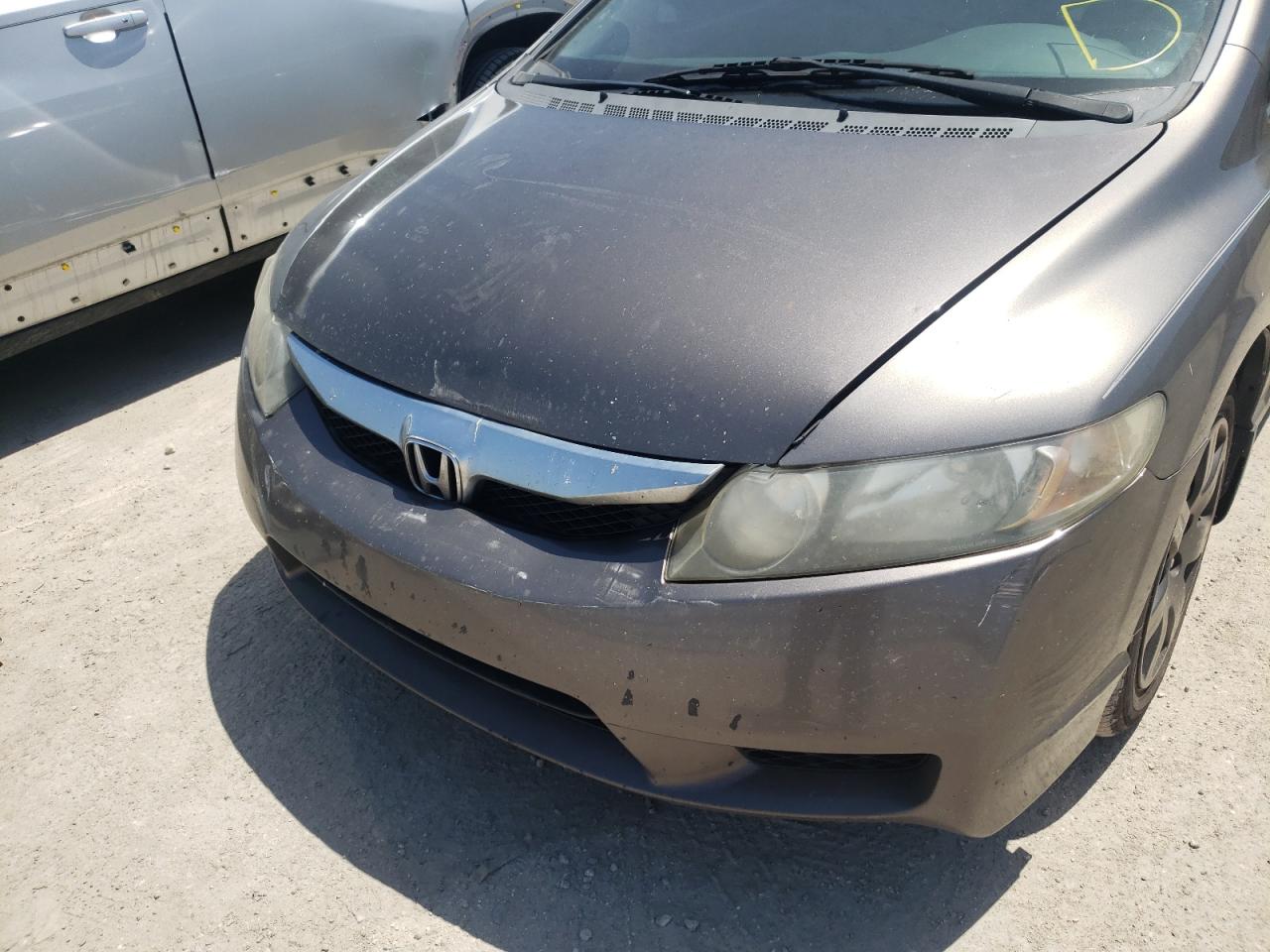 Photo 9 from auction – 2011 HONDA CIVIC LX with VIN 19XFA1F54BE026742