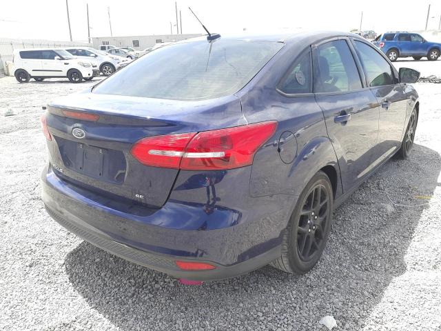 Photo 4 from auction – 2016 FORD FOCUS SE with VIN 1FADP3F24GL340595