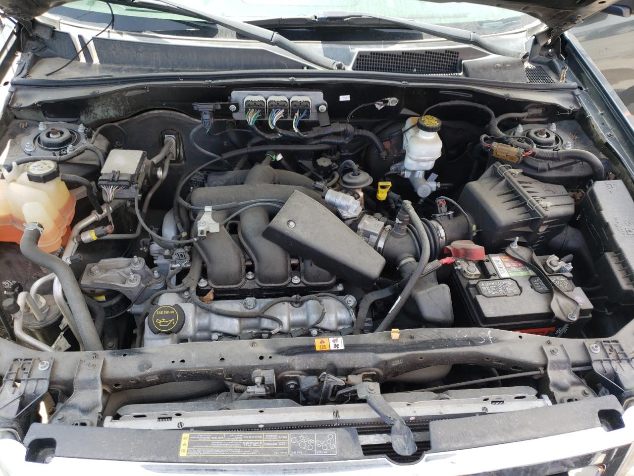 Photo 7 from auction – 2008 FORD ESCAPE LIM with VIN 1FMCU04138KB27213