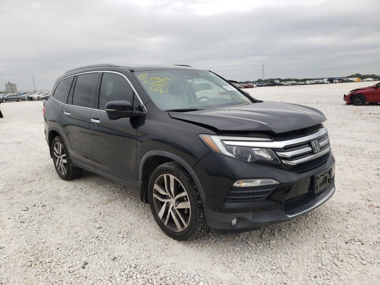Photo 1 from auction – 2016 HONDA PILOT TOUR with VIN 5FNYF5H90GB002862