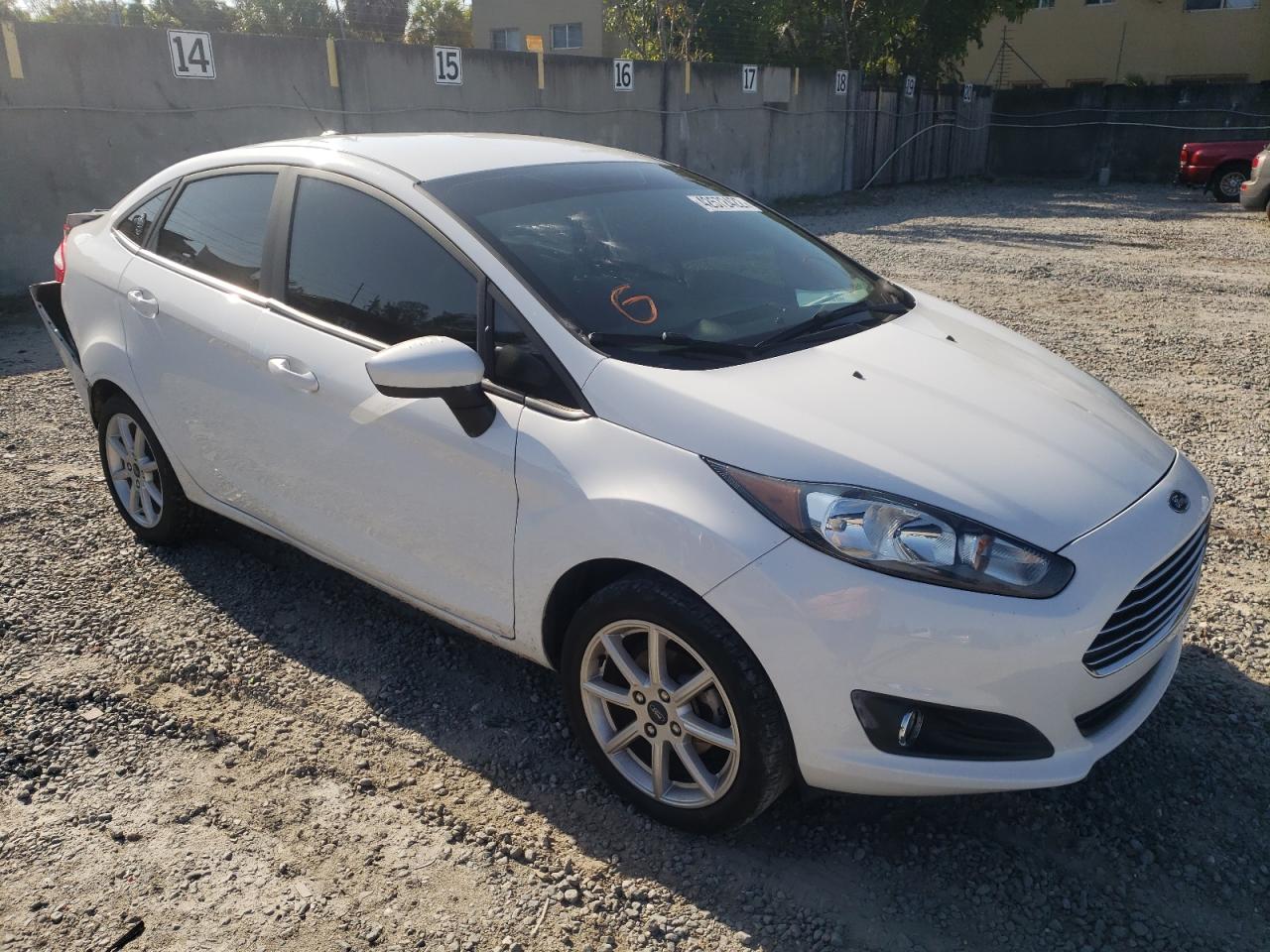 FORD FIESTA SE 2019 with VIN 3FADP4BJ0KM136709 - Photo from auction