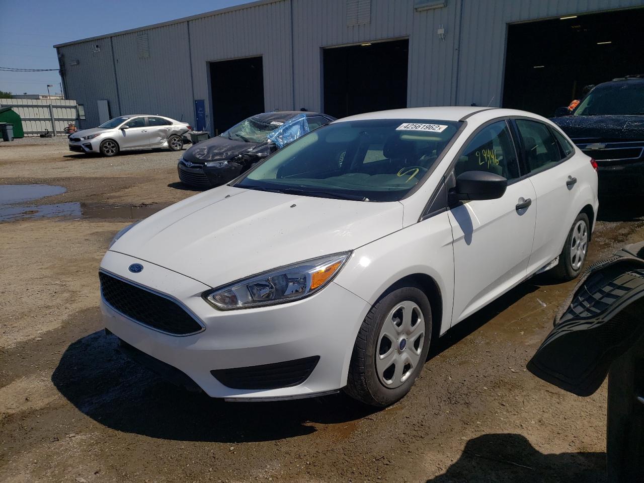 Photo 2 from auction – 2015 FORD FOCUS S with VIN 1FADP3E27FL328036