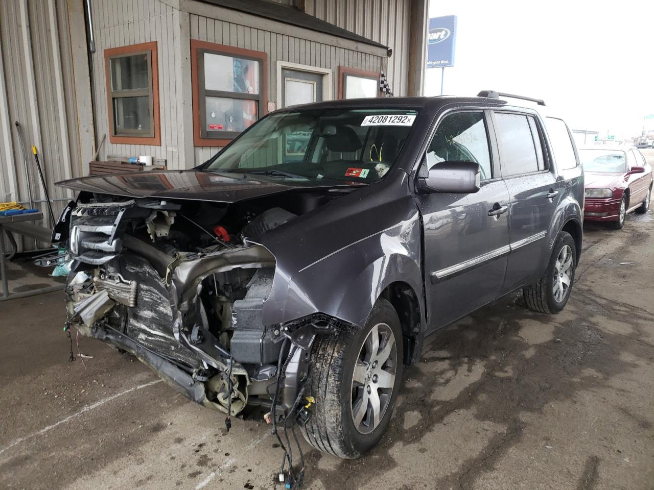 Photo 2 from auction – 2015 HONDA PILOT TOUR with VIN 5FNYF4H93FB029787