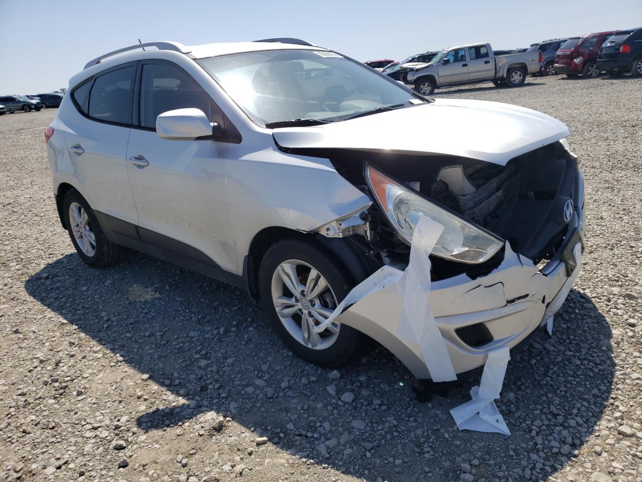 HYUNDAI TUCSON 2011 with VIN KM8JU3AC8BU169063 - Photo from auction