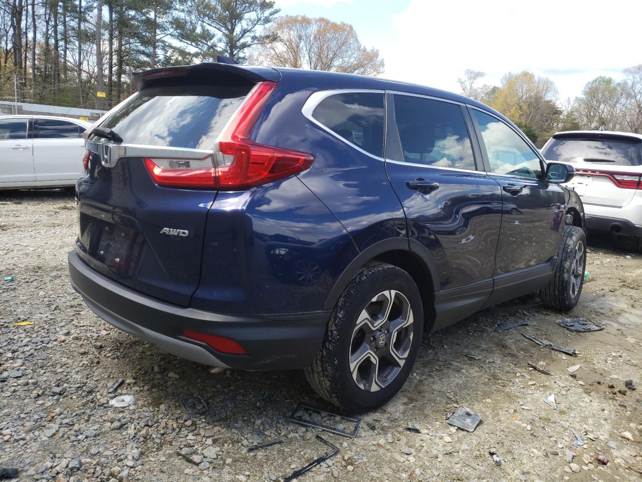 Photo 4 from auction – 2018 HONDA CR-V EX with VIN 7FARW2H50JE102956