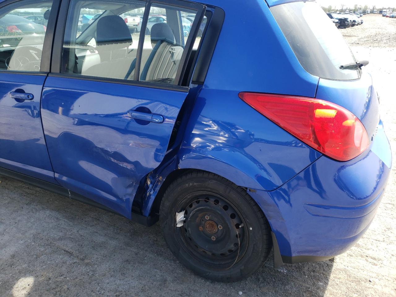 Photo 9 from auction – 2009 NISSAN VERSA S with VIN 3N1BC13E39L481815