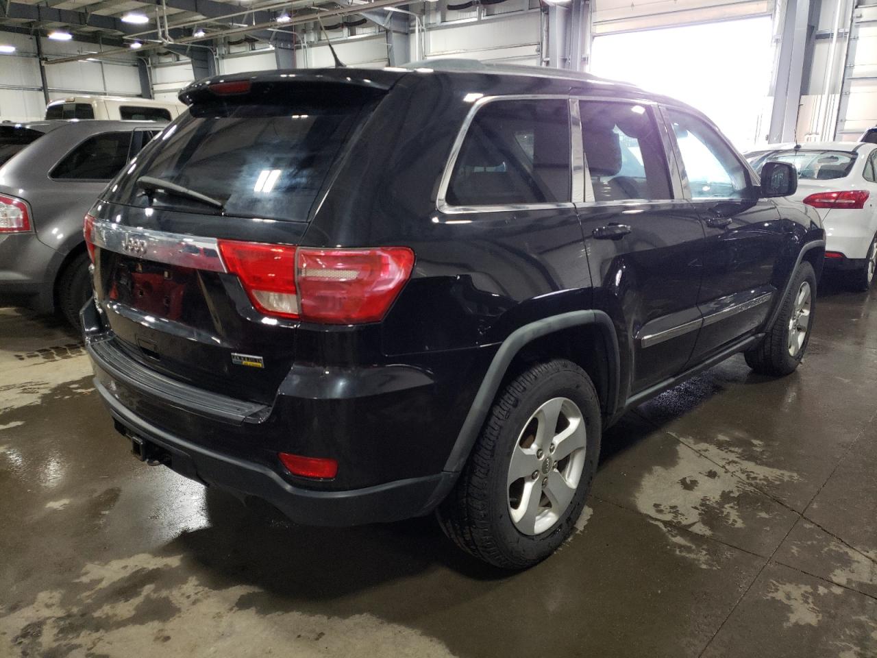 Photo 4 from auction – 2011 JEEP GRAND CHER with VIN 1J4RR4GG7BC567910