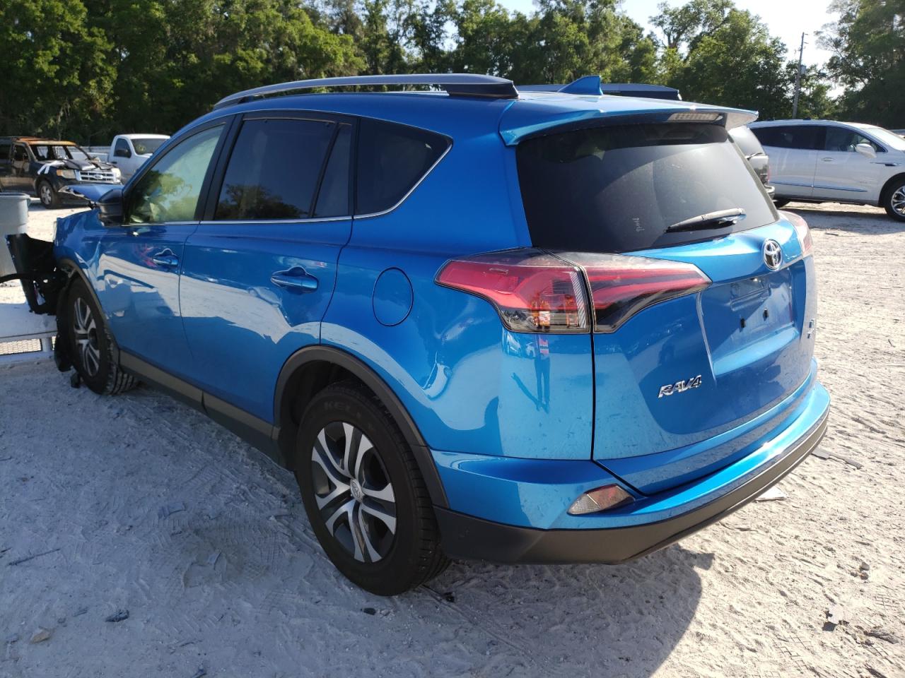Photo 3 from auction – 2018 TOYOTA RAV4 LE with VIN JTMBFREVXJJ219575