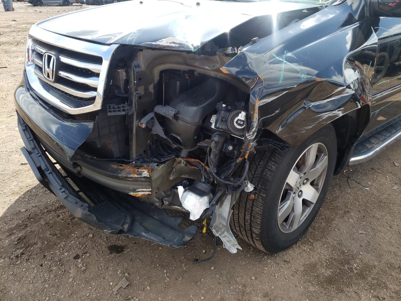 Photo 9 from auction – 2014 HONDA PILOT TOUR with VIN 5FNYF4H95EB037758