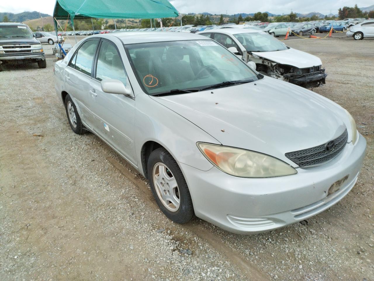 Photo 1 from auction – 2002 TOYOTA CAMRY LE with VIN 4T1BF30K12U532486