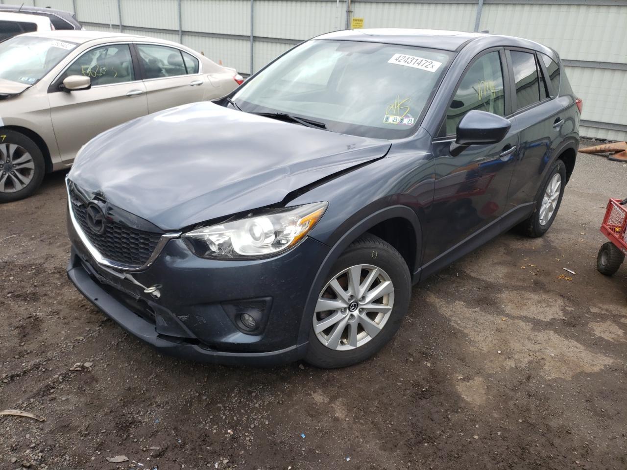 Photo 2 from auction – 2013 MAZDA CX-5 TOURI with VIN JM3KE4CE6D0132136
