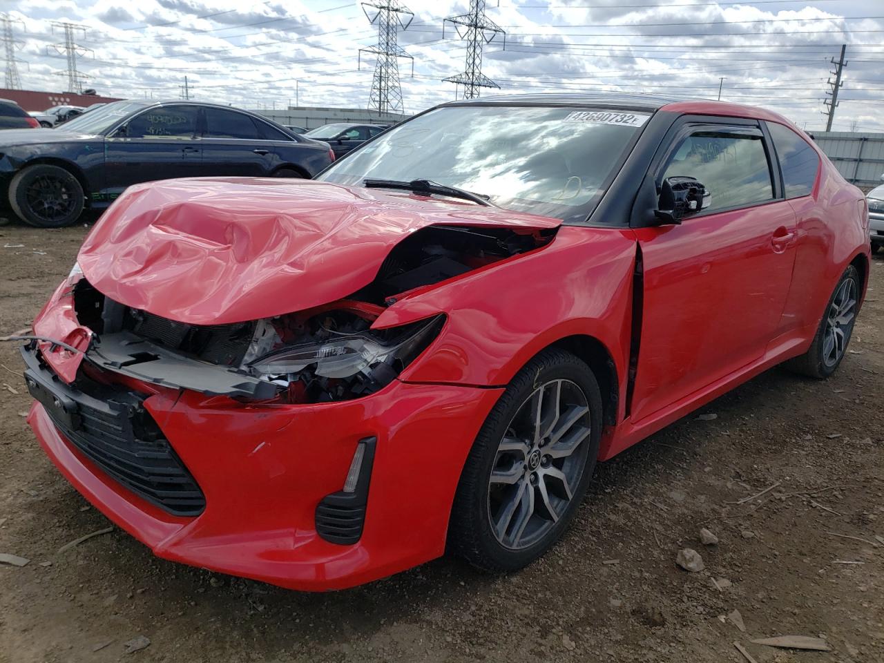 Photo 2 from auction – 2015 TOYOTA SCION TC with VIN JTKJF5C77FJ010464