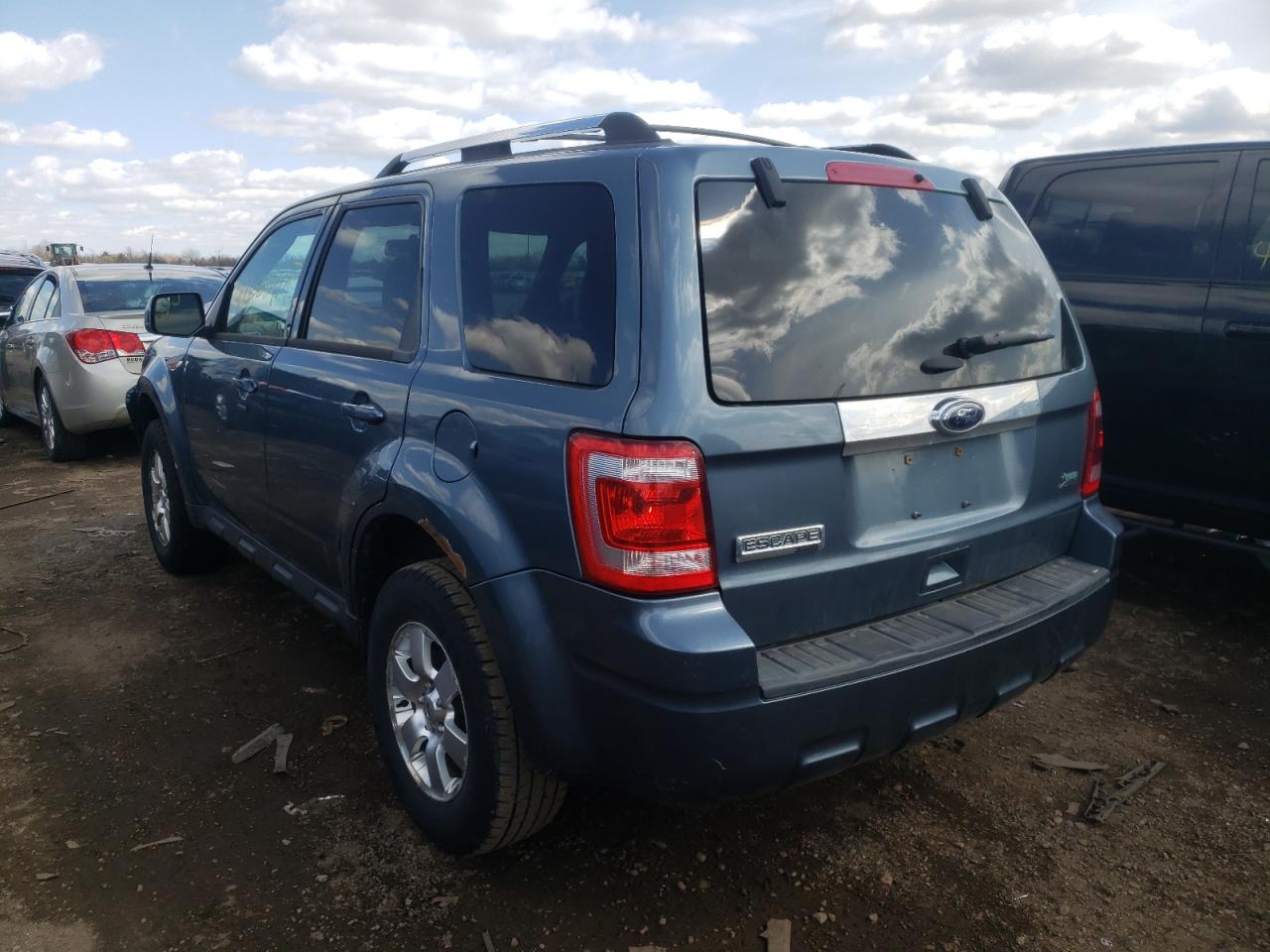 Photo 3 from auction – 2011 FORD ESCAPE LIM with VIN 1FMCU0EG7BKC42164