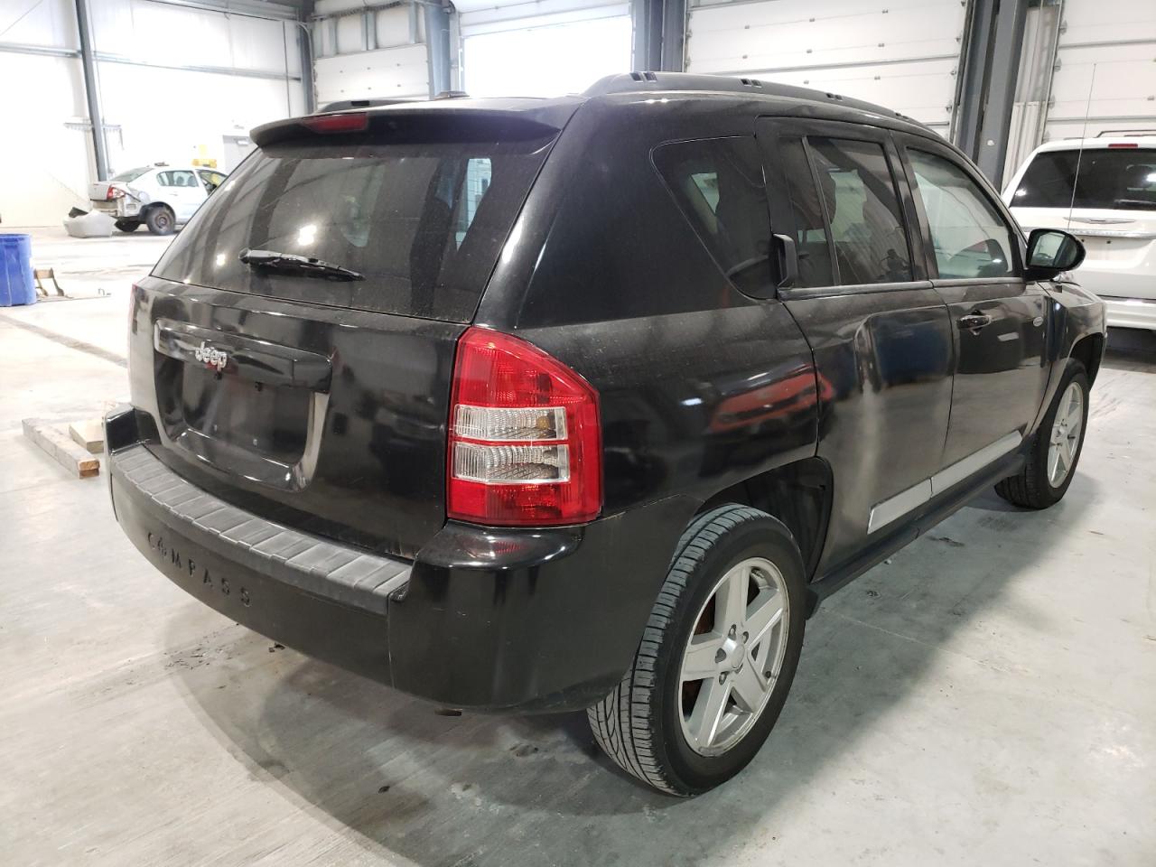 Photo 4 from auction – 2010 JEEP COMPASS SP with VIN 1J4NT1FA6AD640964