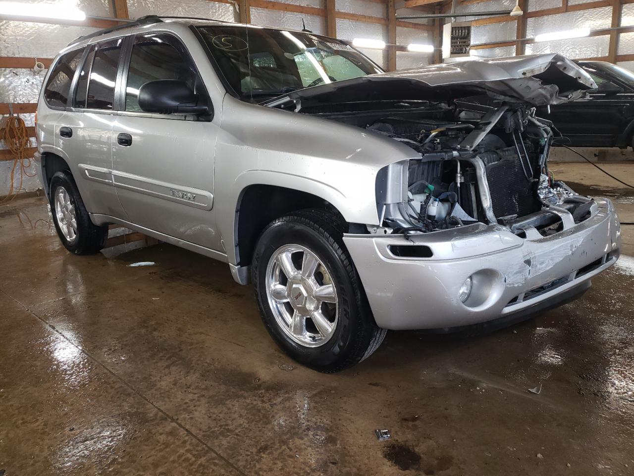 GMC ENVOY 2004 with VIN 1GKDT13S242251113 - Photo from auction