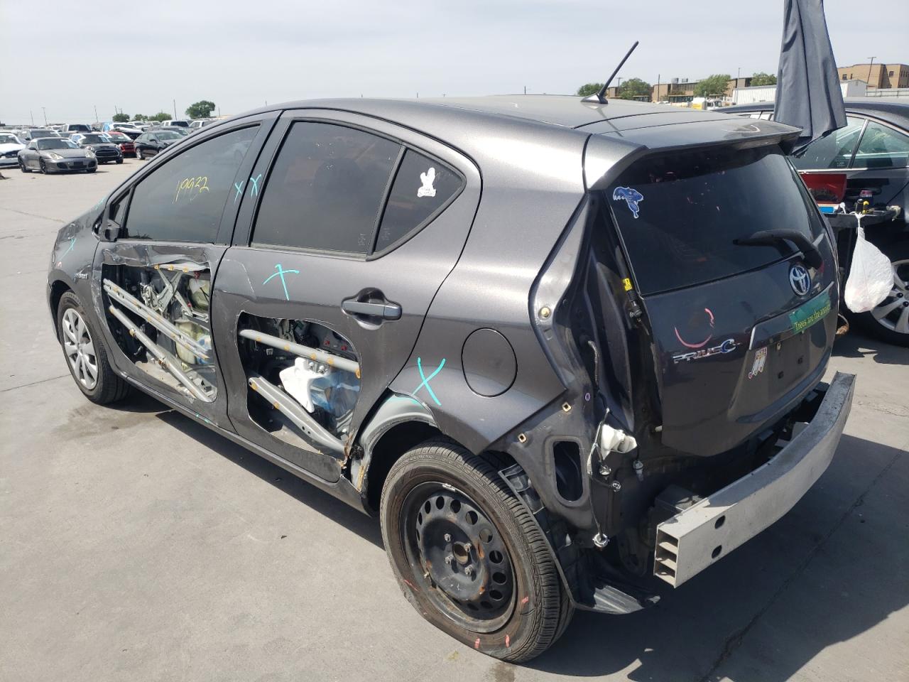 Photo 3 from auction – 2014 TOYOTA PRIUS C with VIN JTDKDTB32E1076648