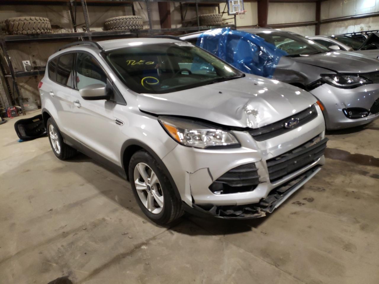 FORD ESCAPE SE 2014 with VIN 1FMCU0G97EUA75263 - Photo from auction